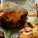 a crab and cheese stuffed mushroom with balsamic glaze on a pan