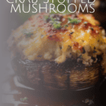 a crab and cheese stuffed mushroom with balsamic glaze on a pan