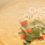 a crockpot of chorizo queso dip with garnish on top