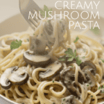 a bowl of Creamy Mushroom Pasta with a fork with pasta on it