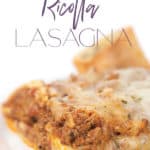 white plate of a piece of no ricotta lasagna with asparagus and toasted bread
