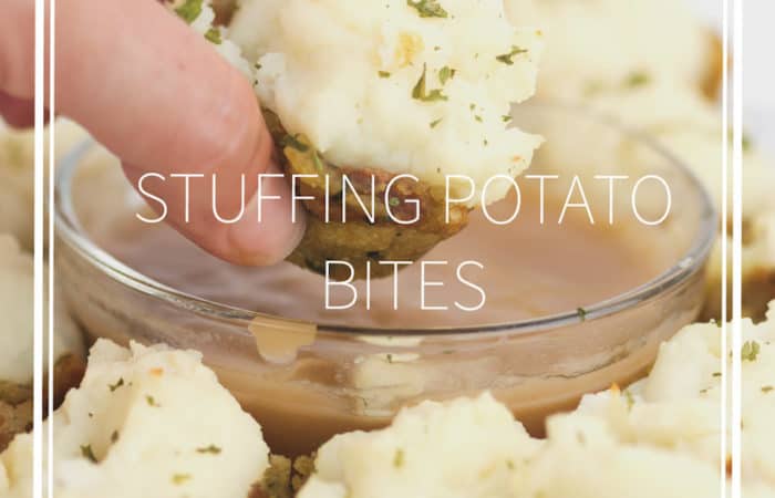 white plate with stuffing potato bbites with one dipping in gravy