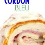 white plate of cut down the middle cordon bleu with ham and cheese inside chicken breast