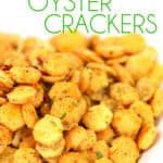 a bowl of spicy ranch oyster crackers with title
