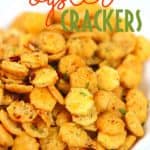 a bowl of spicy ranch oyster crackers with title