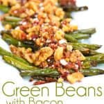 a close up shot of green beans topped with bacon, blue cheese, and walnuts