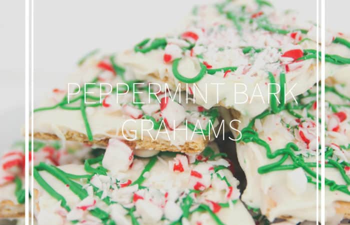 a white plate with white chocolate graham crackers with green drizzle and peppermints