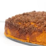 side shot of Easy Pumpkin Crumble Cake on a metal pan