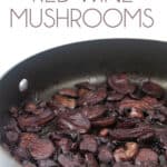 a pan full of sautéed truffle red wine mushrooms