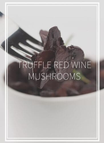 white bowl of sautéed truffle red wine mushrooms and a fork with the mushrooms on it