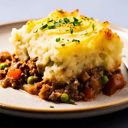 a single serving of shepard's pie made with ground turkey and fluffy mashed potatoes on top