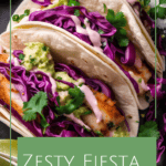 plate of spicy tilapia tacos with red cabbage, cilantro