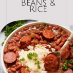 bowl of Ultimate Beans & Rice with sausage and fresh herbs on top