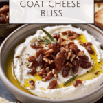 a photo of Whipped Goat Cheese Bliss with chopped dried dates, chopped pecans and olive oil on top