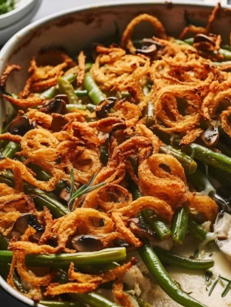 a casserole dish of Epic Green Bean Casserole with crispy onions on top